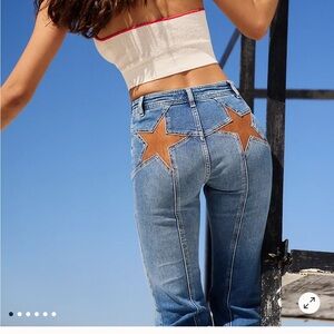 We The Free High Rise Blue Jeans with Brown Star Accents